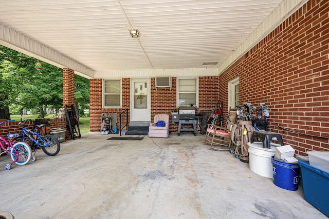4409 Carter Dr, Nunnelly, TN 37137 - view of patio with entry steps and an attached carport