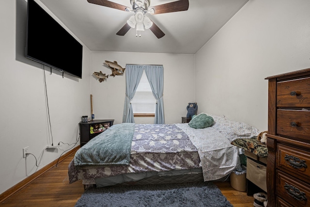4409 Carter Dr, Nunnelly, TN 37137 - bedroom featuring wood finished floors, a ceiling fan, and baseboards