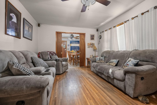 4409 Carter Dr, Nunnelly, TN 37137 - living area featuring a ceiling fan and light wood-type flooring