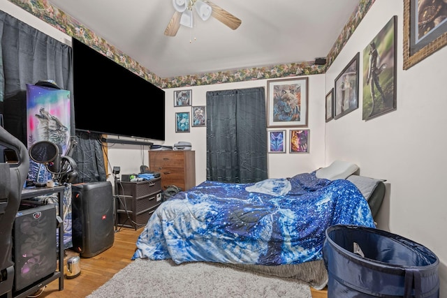 4409 Carter Dr, Nunnelly, TN 37137 - bedroom featuring wood finished floors and a ceiling fan
