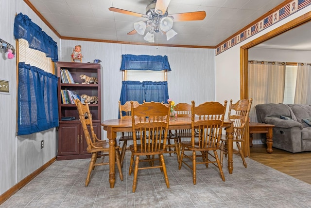 4409 Carter Dr, Nunnelly, TN 37137 - dining area featuring crown molding, a ceiling fan, and baseboards