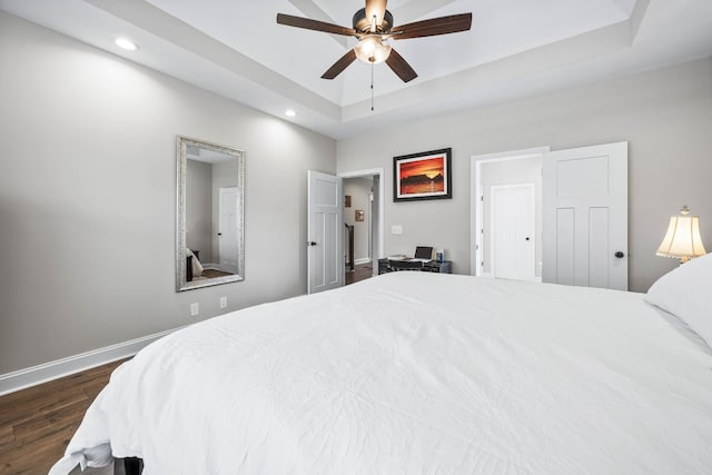 1103 Chagford Dr, Clarksville, TN 37043 - bedroom featuring a raised ceiling, recessed lighting, dark wood finished floors, baseboards, and ceiling fan
