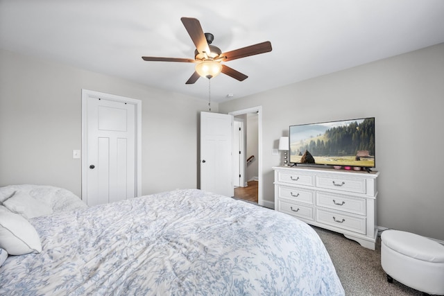 1103 Chagford Dr, Clarksville, TN 37043 - bedroom featuring dark colored carpet, a ceiling fan, and baseboards