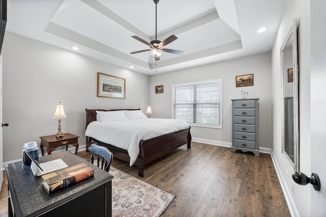 1103 Chagford Dr, Clarksville, TN 37043 - bedroom with a raised ceiling, dark wood finished floors, baseboards, recessed lighting, and a ceiling fan