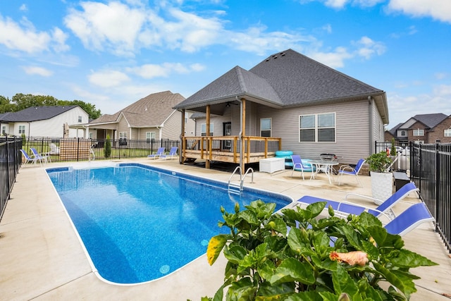 1103 Chagford Dr, Clarksville, TN 37043 - view of swimming pool featuring a wooden deck, a fenced backyard, a residential view, and a patio