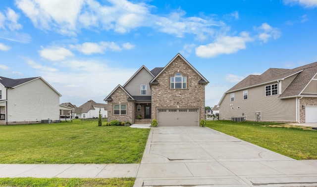 1103 Chagford Dr, Clarksville, TN 37043 - view of front of house featuring brick siding, an attached garage, concrete driveway, and a front lawn