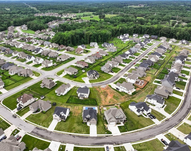 1103 Chagford Dr, Clarksville, TN 37043 - aerial view of property's location with nearby suburban area and a heavily wooded area
