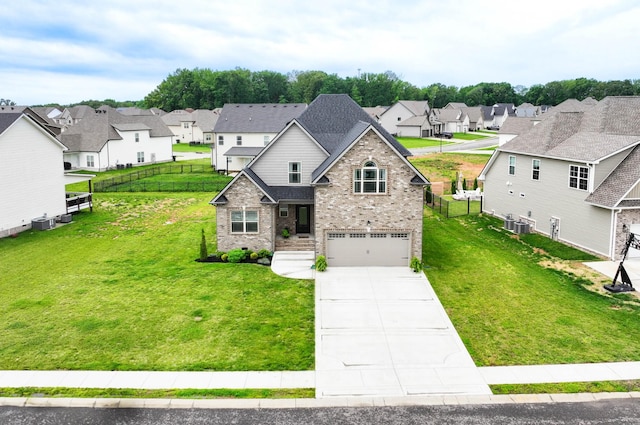 1103 Chagford Dr, Clarksville, TN 37043 - view of front of home featuring a residential view, an attached garage, driveway, brick siding, and cooling unit
