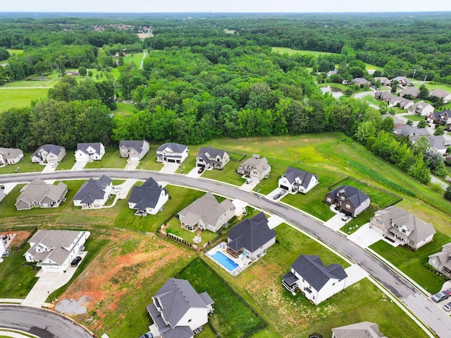 1103 Chagford Dr, Clarksville, TN 37043 - aerial view of property's location featuring nearby suburban area and a forest