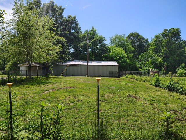 1004 Haydenburg Rd, Whitleyville, TN 38588 - view of yard featuring a pole building and an outdoor structure