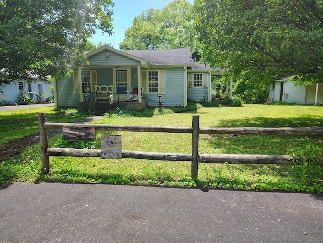 1004 Haydenburg Rd, Whitleyville, TN 38588 - view of front of property featuring covered porch and a fenced front yard