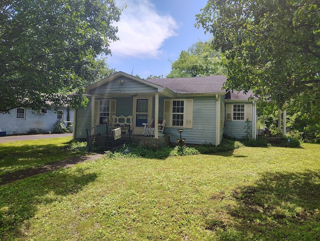 1004 Haydenburg Rd, Whitleyville, TN 38588 - view of front facade featuring covered porch and a front lawn