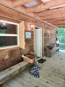 140 Mud Hill Rd, Dover, TN 37058 - mudroom featuring wood-type flooring and a fireplace with raised hearth