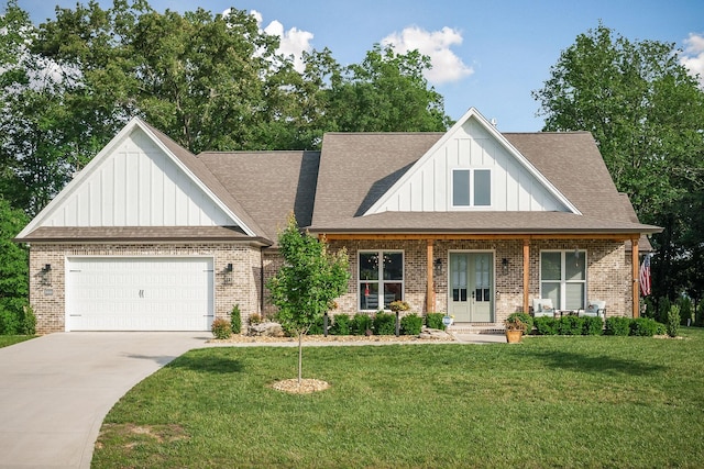 3050 Westowne Cir, Cookeville, TN 38501 - view of front of home with board and batten siding, brick siding, a garage, and driveway