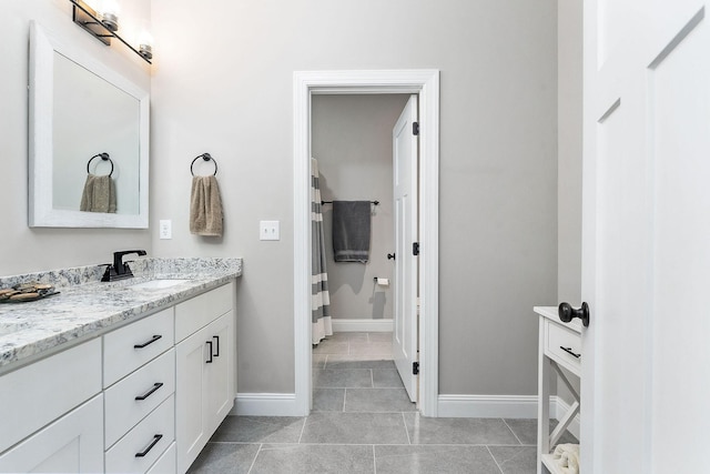 3050 Westowne Cir, Cookeville, TN 38501 - full bathroom with vanity, baseboards, tile patterned floors, and a shower with curtain