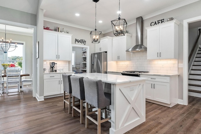 3050 Westowne Cir, Cookeville, TN 38501 - kitchen featuring stainless steel fridge with ice dispenser, wall chimney range hood, a chandelier, stove, and decorative backsplash