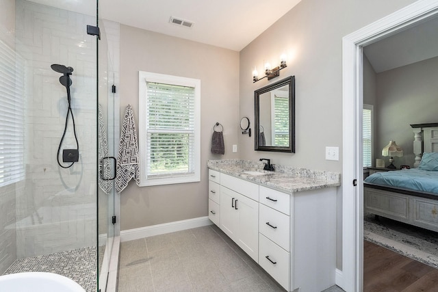 3050 Westowne Cir, Cookeville, TN 38501 - ensuite bathroom with a shower stall, baseboards, and vanity