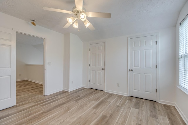 2026 Caladonia Way, Smyrna, TN 37167 - unfurnished bedroom featuring light wood-style floors, baseboards, a textured ceiling, and a ceiling fan