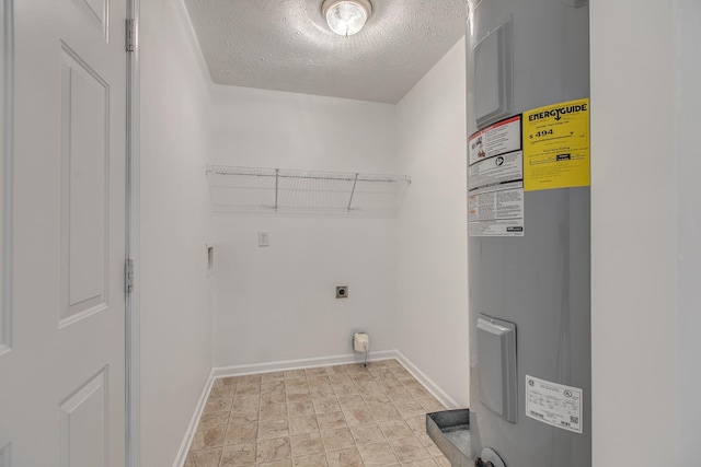 2026 Caladonia Way, Smyrna, TN 37167 - laundry area with electric dryer hookup, electric water heater, a textured ceiling, and baseboards