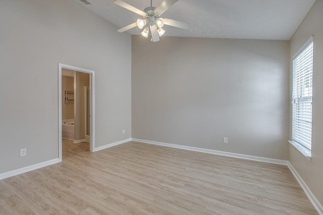2026 Caladonia Way, Smyrna, TN 37167 - unfurnished room with ceiling fan, light wood-style floors, baseboards, and vaulted ceiling
