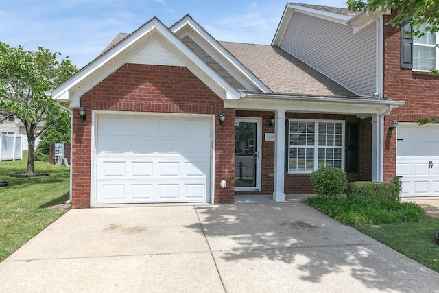 2026 Caladonia Way, Smyrna, TN 37167 - view of front of property featuring brick siding, driveway, an attached garage, a shingled roof, and a front yard