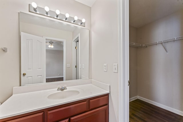 304 Shoshone Pl, Murfreesboro, TN 37128 - bathroom with vanity, wood finished floors, and ceiling fan