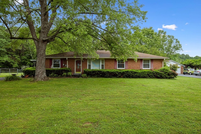 2986 Claylick Rd, Whites Creek, TN 37189 - ranch-style home featuring brick siding and a garage