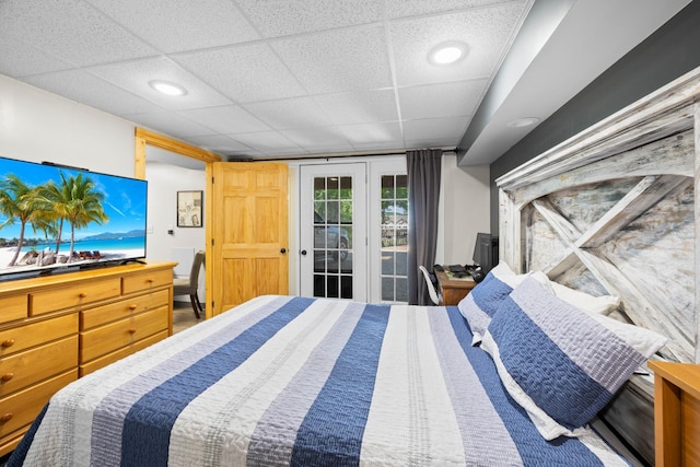 211 Hood St, Dover, TN 37058 - bedroom featuring access to outside, a paneled ceiling, and recessed lighting