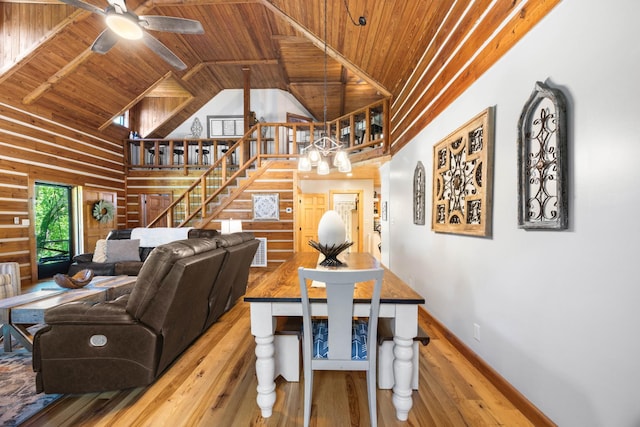 211 Hood St, Dover, TN 37058 - dining room with wood ceiling with exposed beams, ceiling fan, stairway, hardwood / wood-style floors, and high vaulted ceiling