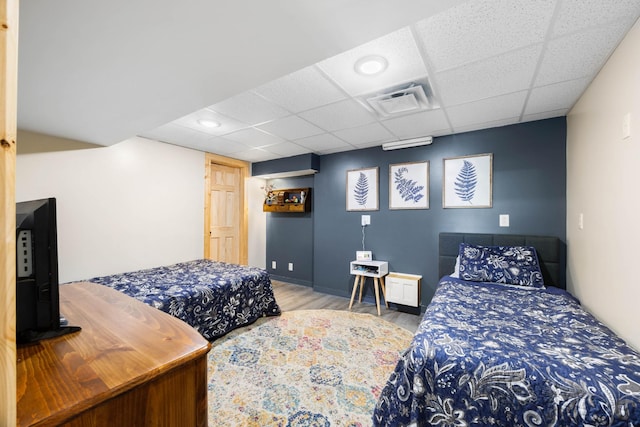 211 Hood St, Dover, TN 37058 - bedroom featuring a drop ceiling and wood finished floors