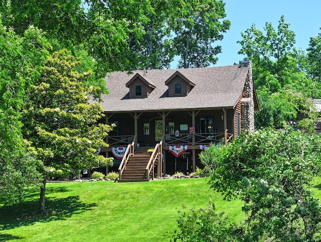 211 Hood St, Dover, TN 37058 - view of front of property with stairs, a front lawn, a shingled roof, and a chimney