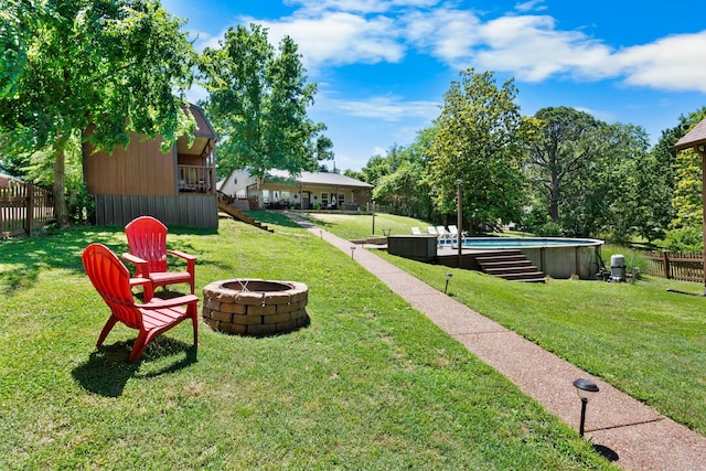 211 Hood St, Dover, TN 37058 - view of yard featuring a fire pit and an outdoor pool