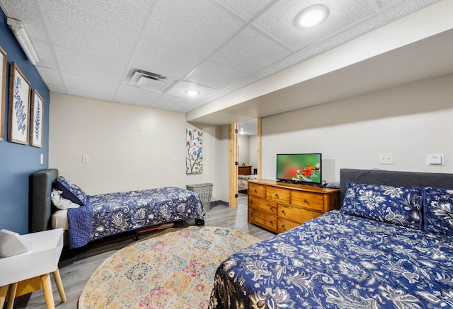 211 Hood St, Dover, TN 37058 - bedroom featuring a drop ceiling, light wood-style flooring, and recessed lighting