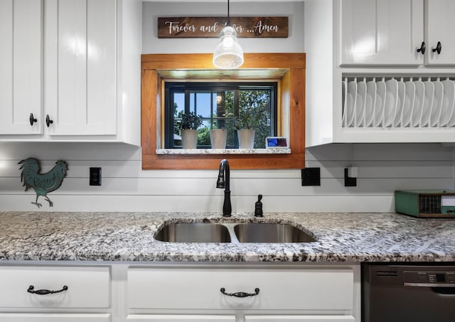 211 Hood St, Dover, TN 37058 - kitchen featuring a sink, black dishwasher, white cabinetry, and light stone counters