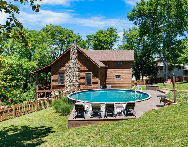 211 Hood St, Dover, TN 37058 - view of swimming pool with a wooden deck
