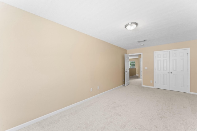 1036 Harold Lee Dr, Smyrna, TN 37167 - unfurnished bedroom featuring baseboards, light carpet, and a closet