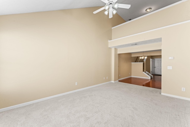 1036 Harold Lee Dr, Smyrna, TN 37167 - spare room featuring carpet floors, baseboards, a ceiling fan, a chandelier, and high vaulted ceiling