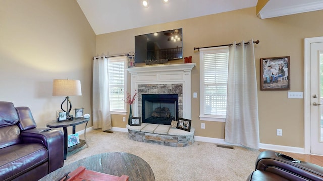 1032 Stonehollow Way, Mount Juliet, TN 37122 - carpeted living area featuring a fireplace, vaulted ceiling, and baseboards