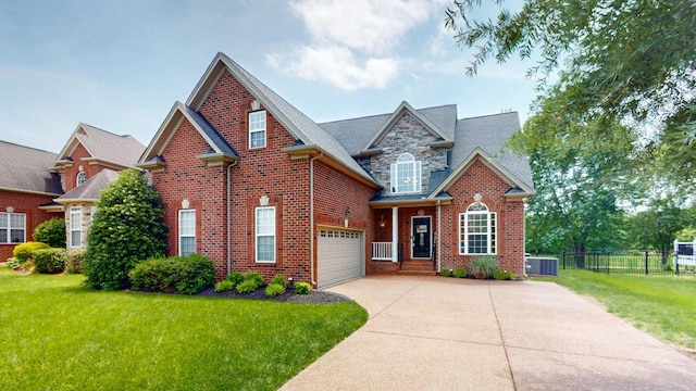 1032 Stonehollow Way, Mount Juliet, TN 37122 - traditional-style house featuring driveway, brick siding, cooling unit, and a garage