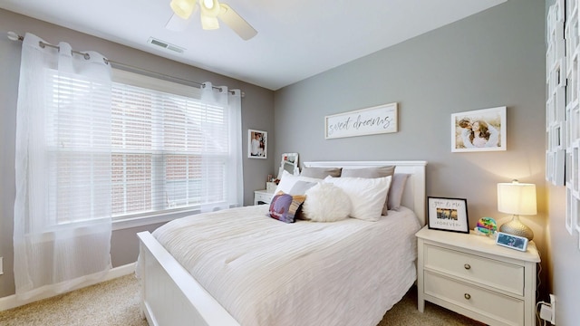 1032 Stonehollow Way, Mount Juliet, TN 37122 - bedroom featuring light carpet, multiple windows, baseboards, and a ceiling fan