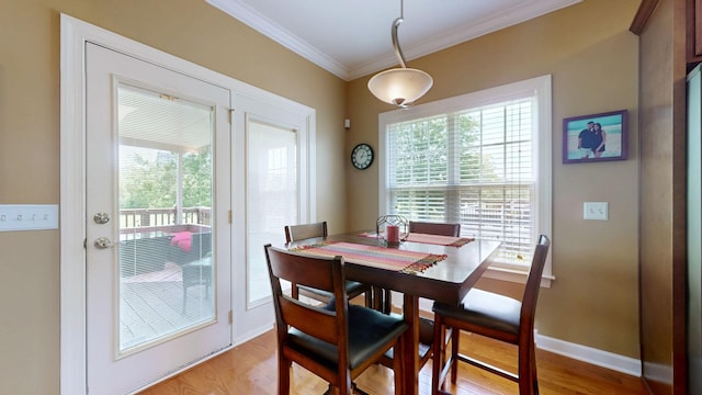1032 Stonehollow Way, Mount Juliet, TN 37122 - dining area featuring crown molding, plenty of natural light, light wood-style flooring, and baseboards