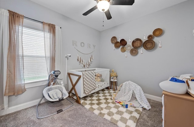 720 Jersey Dr, Clarksville, TN 37043 - bedroom featuring a crib, ceiling fan, baseboards, and radiator