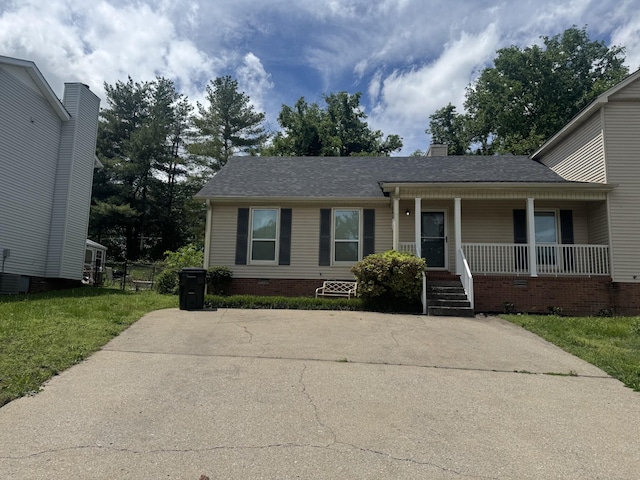 1016 Silver Point Dr, Murfreesboro, TN 37130 - view of front of home featuring covered porch, crawl space, a chimney, a front yard, and a shingled roof
