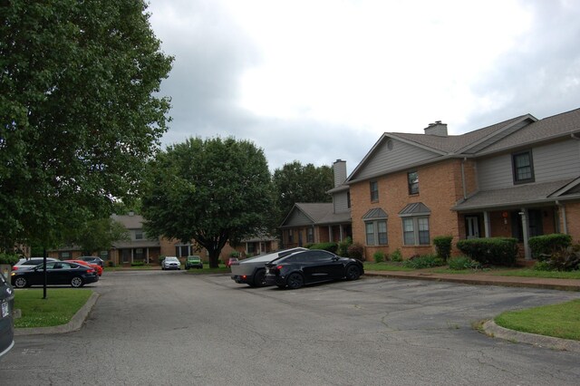 125 Ellington Pl, Madison, TN 37115 - view of asphalt road with curbs