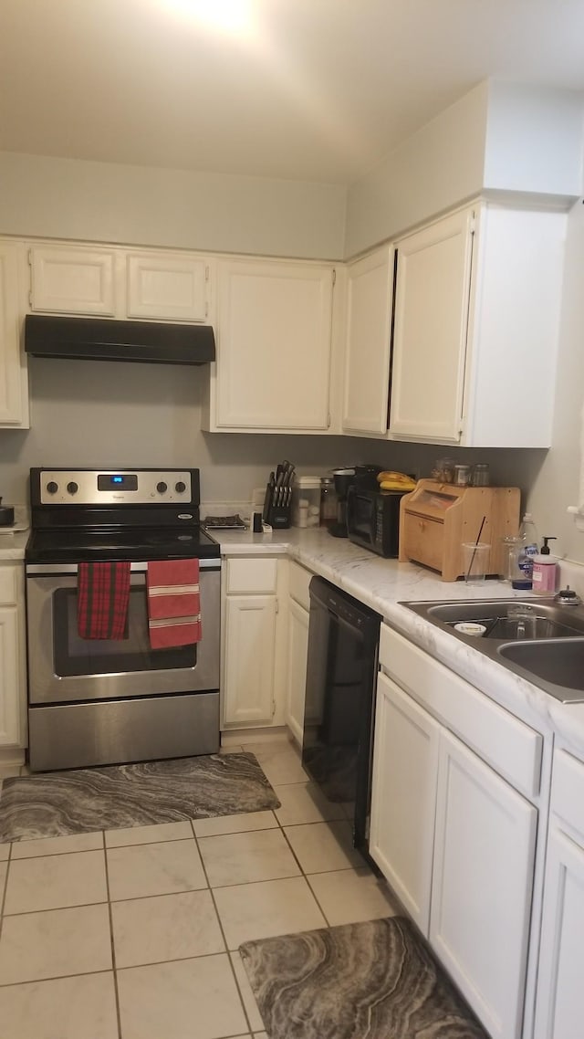 125 Ellington Pl, Madison, TN 37115 - kitchen featuring stainless steel range with electric stovetop, under cabinet range hood, black dishwasher, white cabinets, and light countertops