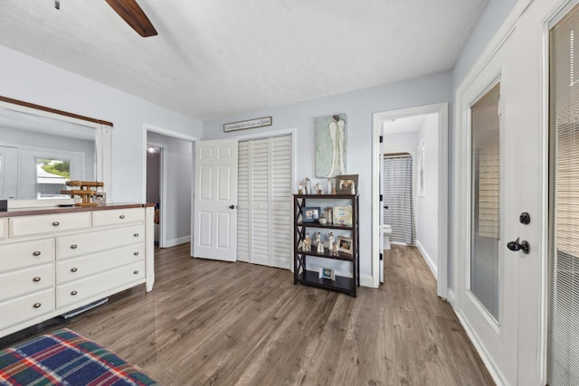 530 Maplewood Dr, Cornersville, TN 37047 - bedroom featuring wood finished floors, baseboards, a closet, and a ceiling fan