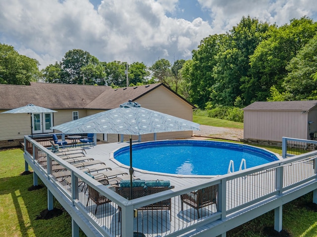 530 Maplewood Dr, Cornersville, TN 37047 - swimming pool with a wooden deck, french doors, and a lawn
