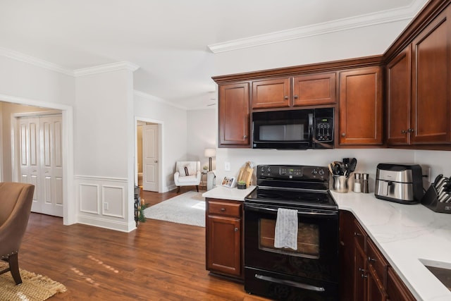 816 General Cabot Ct, Murfreesboro, TN 37129 - kitchen with black appliances, ornamental molding, dark wood-style flooring, light stone counters, and a wainscoted wall