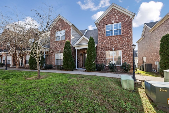 816 General Cabot Ct, Murfreesboro, TN 37129 - view of front facade with brick siding, cooling unit, and a front yard