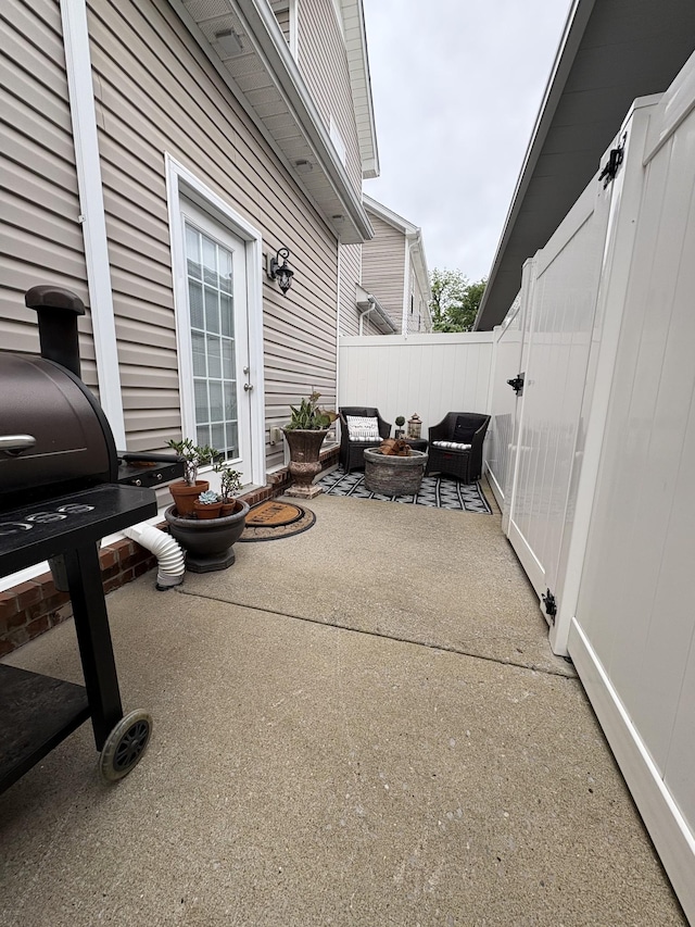 816 General Cabot Ct, Murfreesboro, TN 37129 - fenced backyard featuring a patio area and an outdoor living space with a fire pit